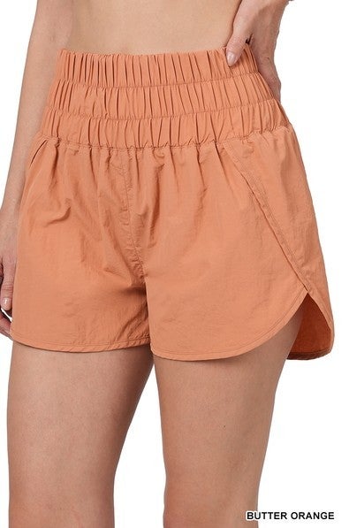 Butter Orange Smocked Windbreaker Shorts